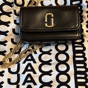 The Glam Shot mini convertible leather crossbody by Marc Jacobs.Fits cellphone